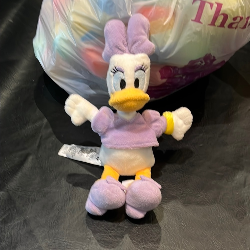 Plush Toy with Purple Outfit